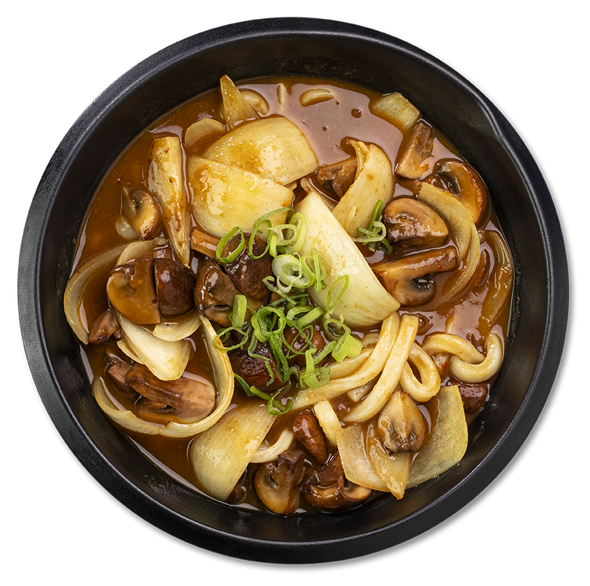 Curry udon with mushrooms, onions and green onions