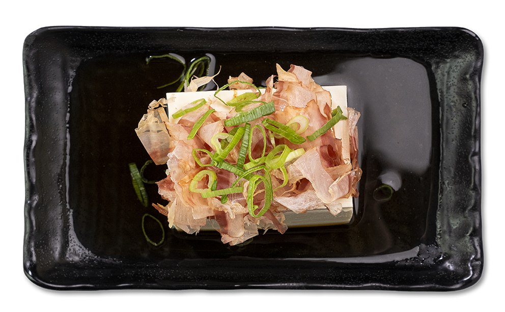 Hiyayakko cold tofu with bonito flakes and green onions