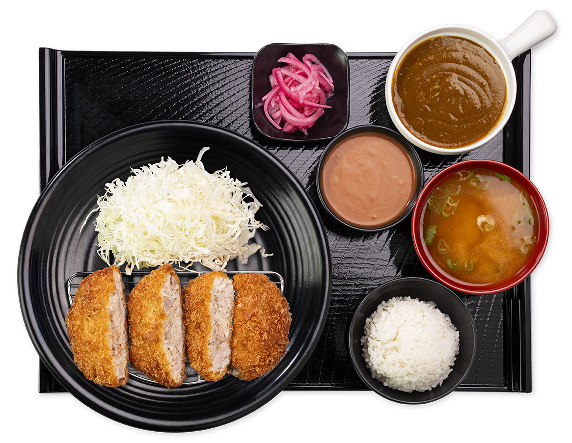 Menchi katsu set with rice, miso soup, cabbage and sauces