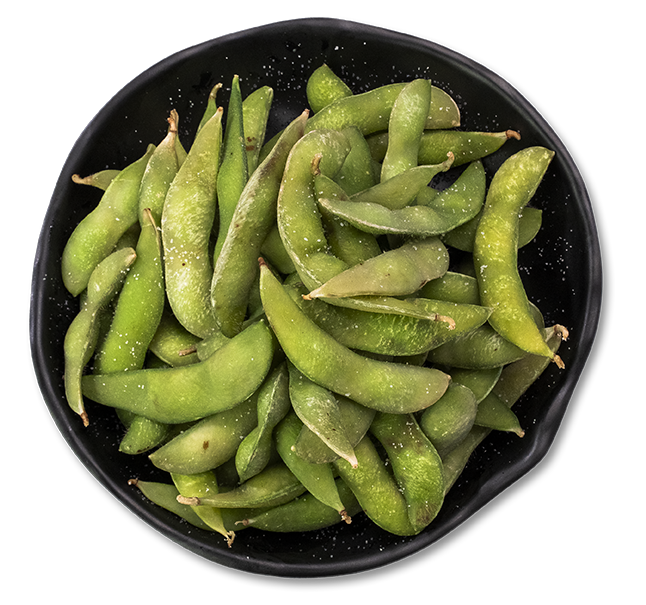 Salted edamame in a black bowl